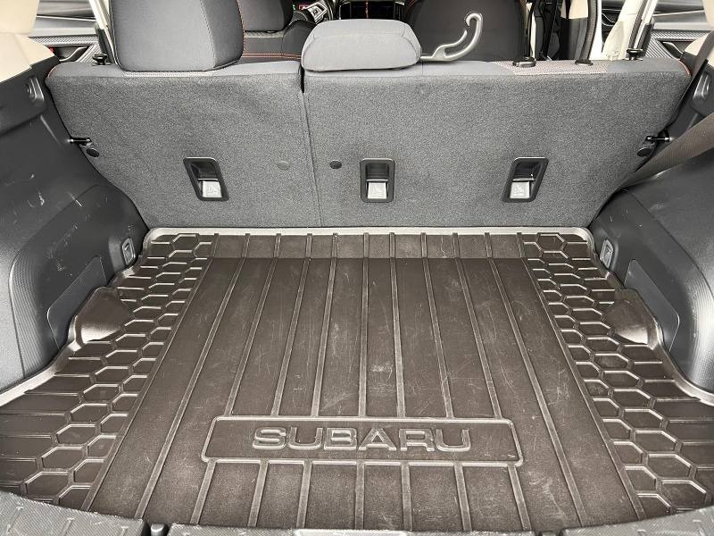 After detailing: Subaru trunk fully cleaned and restored, with a spotless floor and cargo area, showcasing a fresh, organized, and like-new appearance with a thorough professional clean